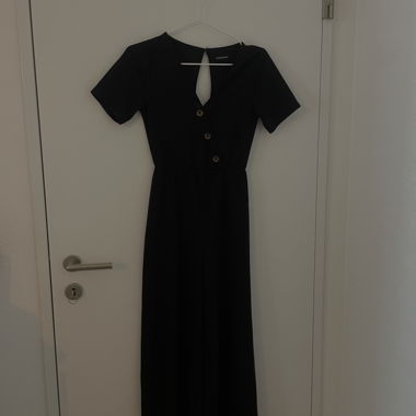 Schwarzer Overall