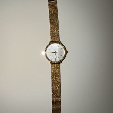 Goldene Michael Kors-Uhr