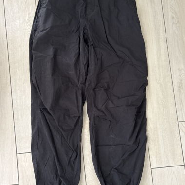 Black low-rise parachute pants
