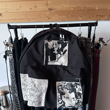 Black backpack with prints