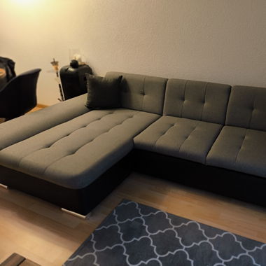 Ecksofa mit Schlaffunktion und Stauraum