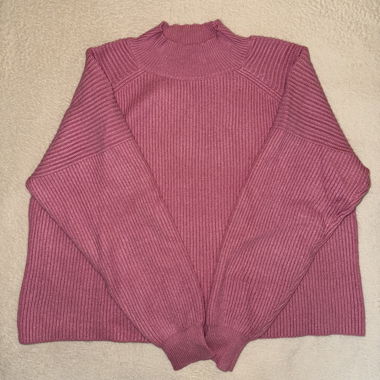 Pink knit sweater with stand-up collar