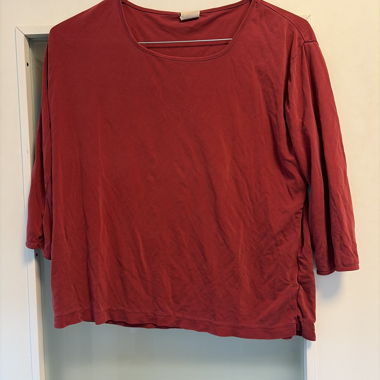 Red long-sleeve shirt