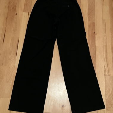 Pantalon large noir en tissu taille haute