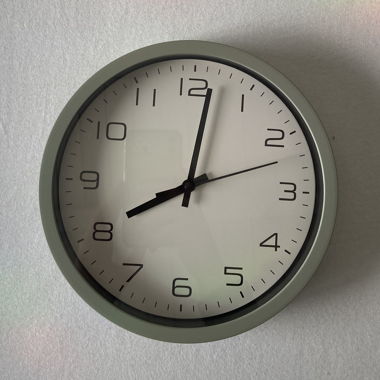 Orologio da parete con cornice verde