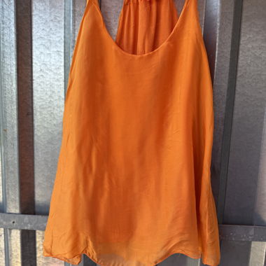 Orange sleeveless top