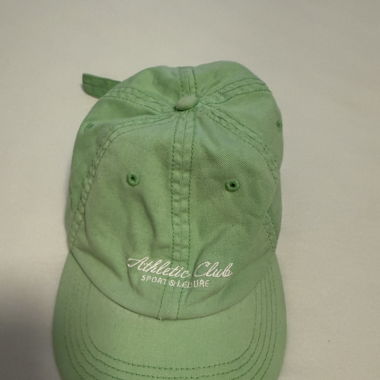 grünes Cap
