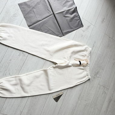 Fear of God Essentials Jogginghose Creme