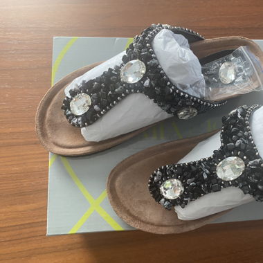 Neue Sandalen
