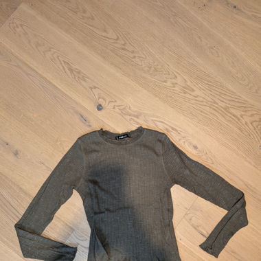 Grüner Pulli