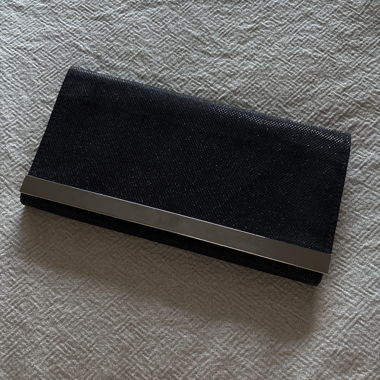 Clutch scintillante con barra metallica
