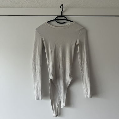 Beige long-sleeve bodysuit