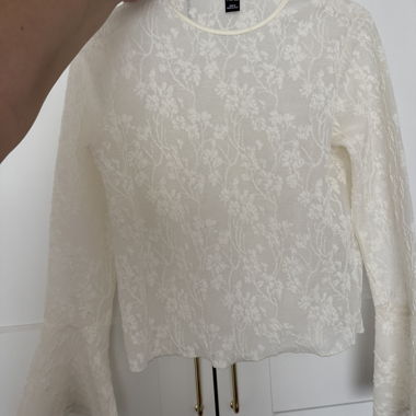Top in pizzo bianco a maniche lunghe