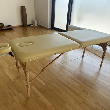 Foldable massage table with accessories and carrying bag