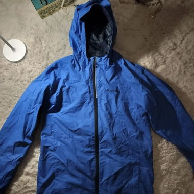 Veste imperméable Columbia bleue à capuche
