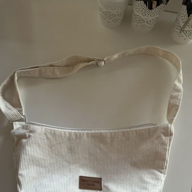 Marsupio grande beige in tessuto a coste