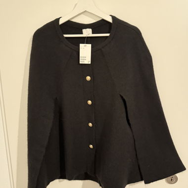 Cape nero H&M