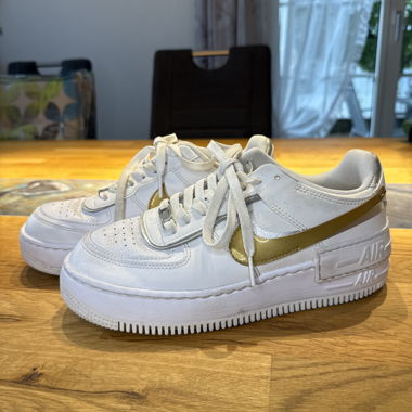 White-and-Gold Air Force Sneakers