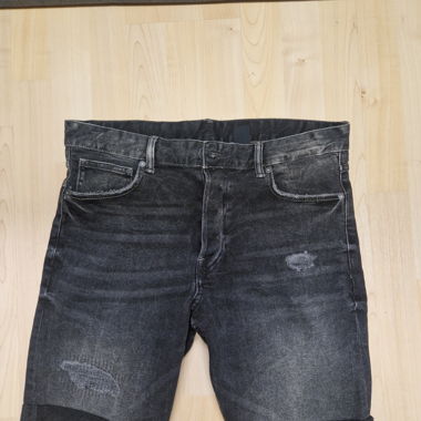Shorts in jeans neri con effetto used