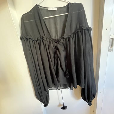 Camicia larga trasparente