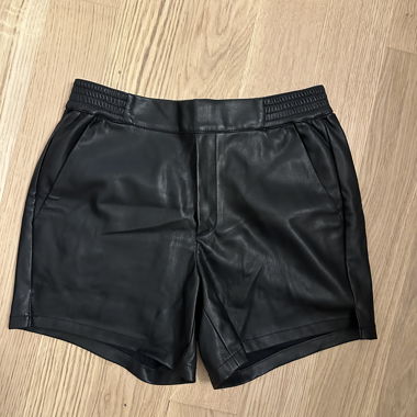 Black faux leather shorts
