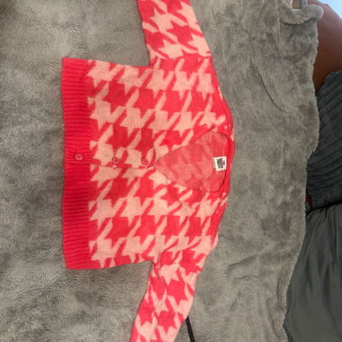 Cardigan rosa con motivo pied de poule