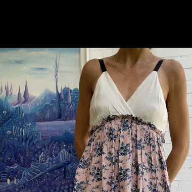 Dress with white top and floral pink skirt. Vostik
