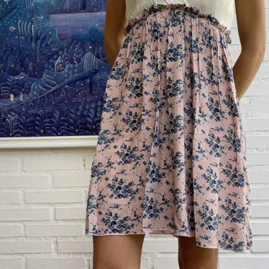 Dress with white top and floral pink skirt. Vostik