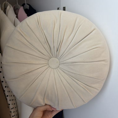 Round beige seat cushion