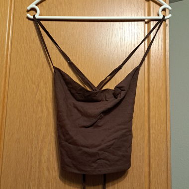 Backless, midriff-baring top
