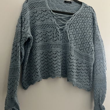Sweater with eyelet pattern