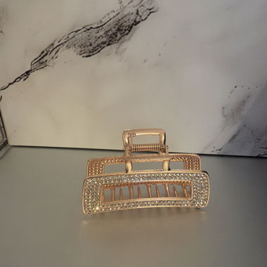 Fermaglio per capelli dorato con strass