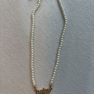 Collana di perle con ciondolo "baby"