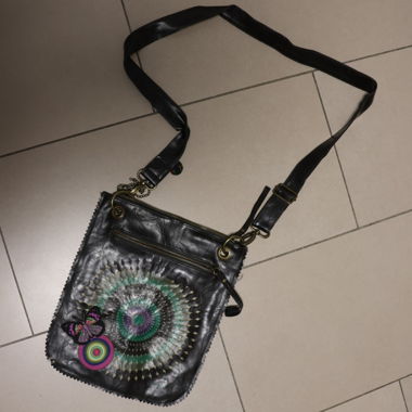 Black tote bag with various patterns