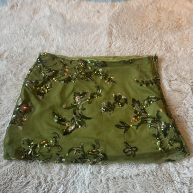Jupe courte à sequins vert