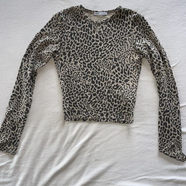 pull léopard moulant 