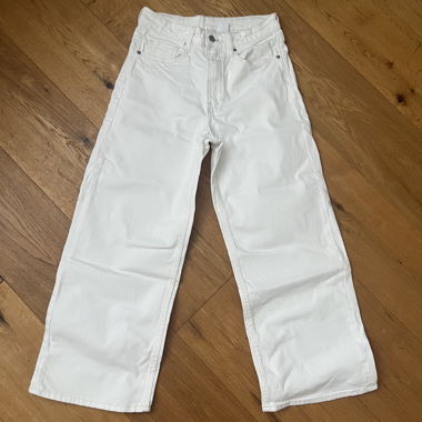 Jeans bianchi a gamba larga, cropped