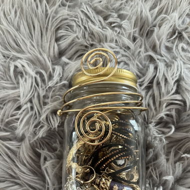 Gold and black jewelry jar
