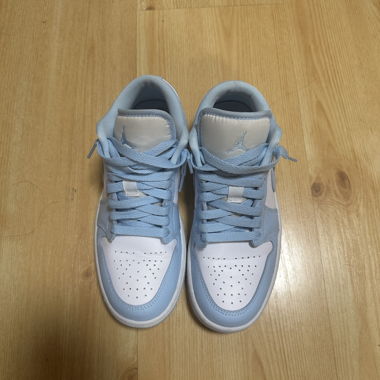 Nike Air Jordan 1 low blanc / bleu glace