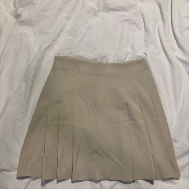 Jupe plissée beige