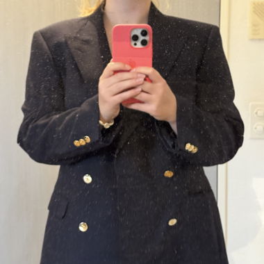 Navy blazer with gold accents