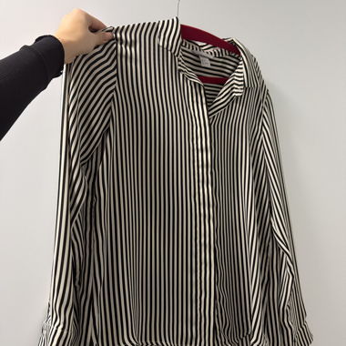 Blusa a maniche lunghe a righe
