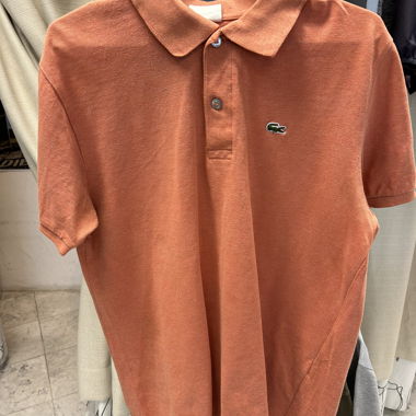 Polo Lacoste arancione taglia M