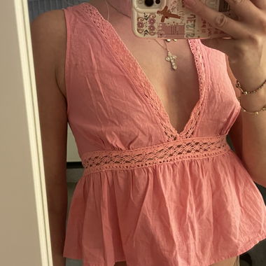 Haut en dentelle rosé