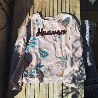Girls' pale pink sweatshirt with floral motifs age 8