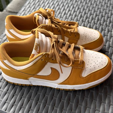 Nike Dunks in mustard yellow