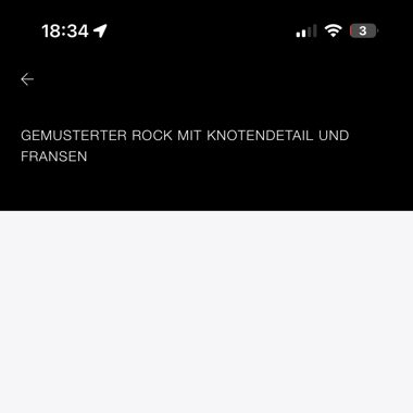 Gemusterter Minirock mit Knoten und Fransen