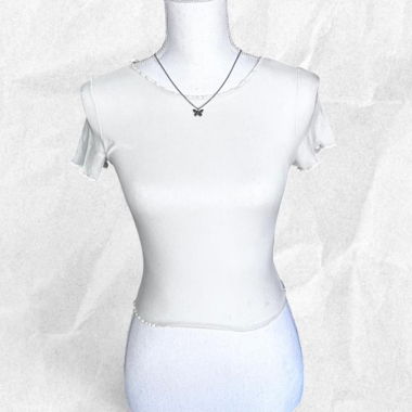 cream ruffle top 