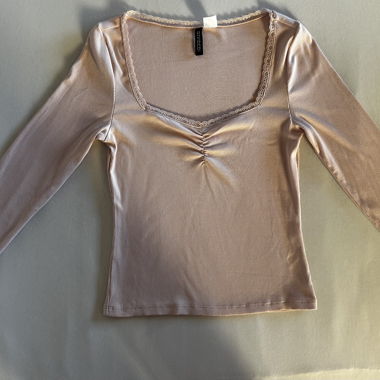Top rosa a maniche lunghe