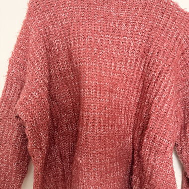Maglione rosa mélange in morbida maglia peluche con collo alto